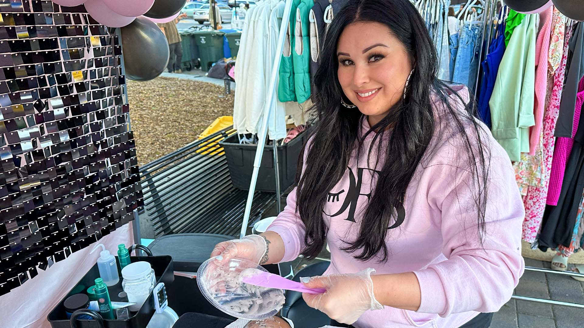 OFS at The SoCo Market. In this image, Brittney Tolosa the owner mixes a Hydrojelly Mask.
